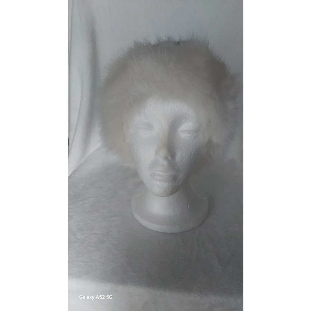 Enjoy Wild Elegance with this Faux Fur Leopard Print Hat White and black